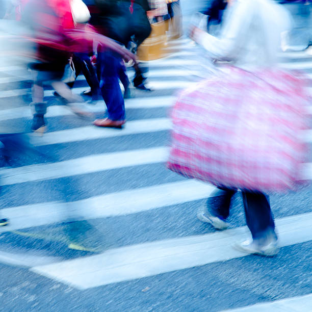 istock people crowd on zebra crossing street 186053175