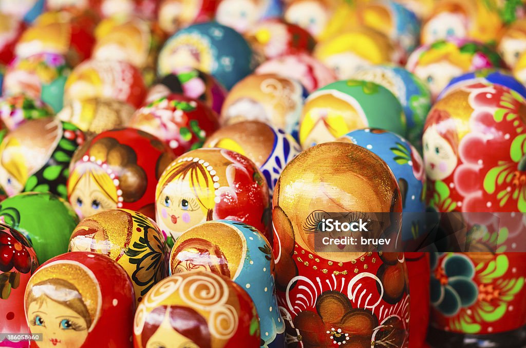 Colorful Russian nesting dolls at the market Colorful Russian nesting dolls matreshka at the market. Matrioshka Nesting dolls are the most popular souvenirs from Russia. Adult Stock Photo