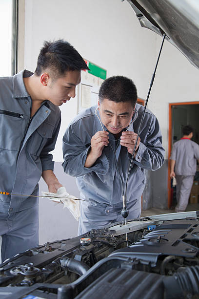 istock Mechanic Listening to Engine 186058615