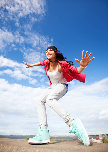 istock beautiful dancing girl in movement 186059091