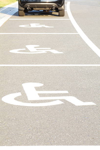 istock Several handicap parking areas reserved for disabled people 186059255