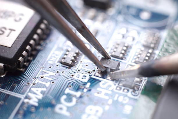 istock Soldering and assembly of SMD transistor 186060900