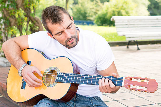istock Musician with classic guitar. 186061320