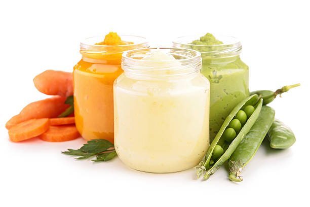 Three pots of nutritious baby food baby food baby food stock pictures, royalty-free photos & images