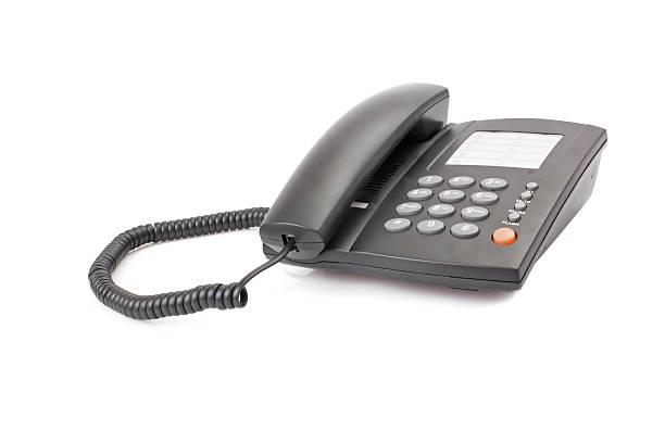 istock Black office telephone isolated on white 186062133