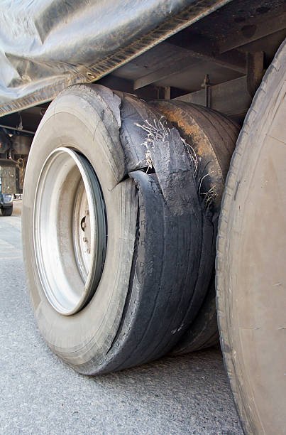 istock burst tire truck 186062809