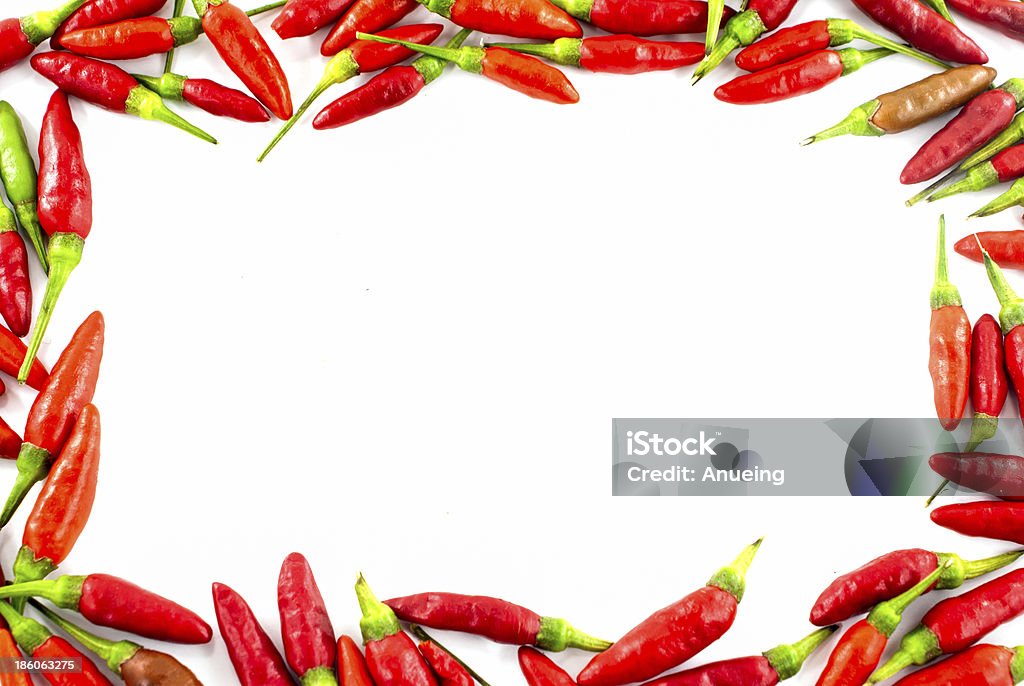 Pimiento rojo fresco frontera sobre fondo blanco - Foto de stock de Afilado libre de derechos