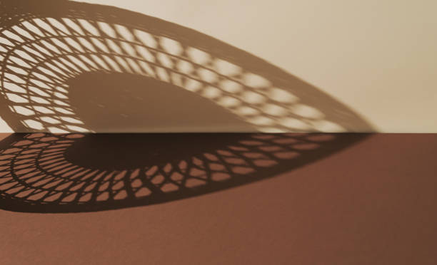 Trendy composition of heart shadow. An original background image for design, product presentation or creative work, with a play of light and shadow. Minimal love concept. Copy space. Shadow aesthetic.
