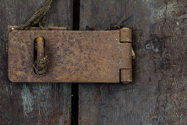 Closeup of old rusty door hinge stock photo
