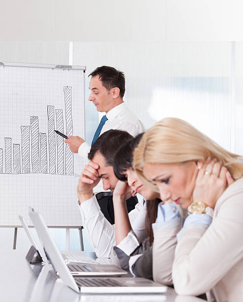 istock Frustrated Employees In Business Meeting 186068365