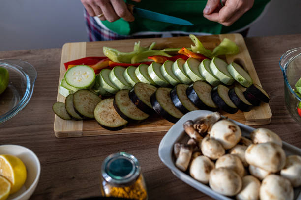 istock Table scene with nutritious vegetables, pices, and mushrooms. 1860694577