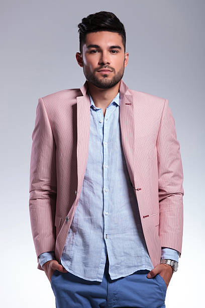 istock casual man with lapels raised looks at you 186073346