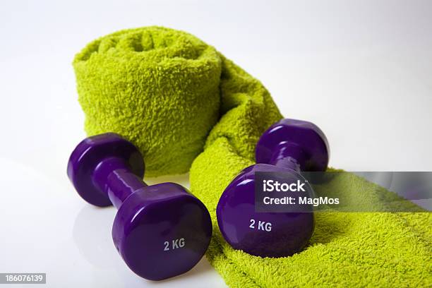 Dumbbell Weights And Olive Towel Stock Photo - Download Image Now - Anaerobic Exercise, Close-up, Cut Out