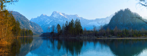 istock Lake Almsee in Alps mountains, Austria. Beautiful sunset landscape. 1860783082