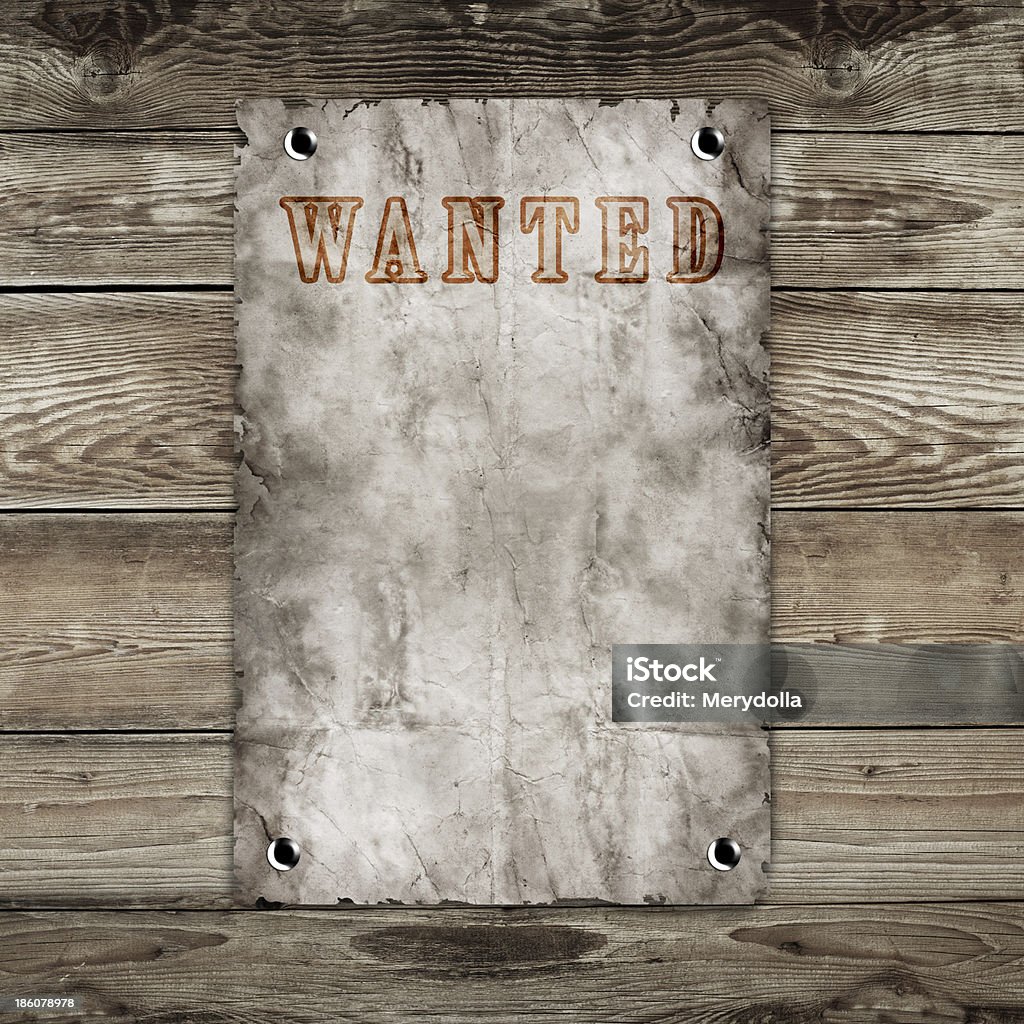 wanted-cartaz em inglês velho oeste em fundo de madeira - Foto de stock de Alfinetar royalty-free