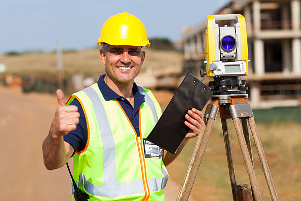 istock land surveyor giving thumb up 186080476