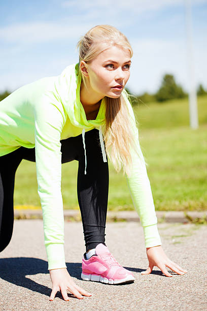 istock woman doing running outdoors 186080808
