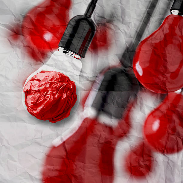 istock creative idea and leadership concept light bulb on crumpled pape 186081643