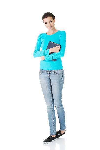 istock Attractive young woman holding a book. 186081704
