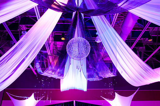 Reception Decorations Reception decoration beautifully lit with purple lighting. prom stock pictures, royalty-free photos & images