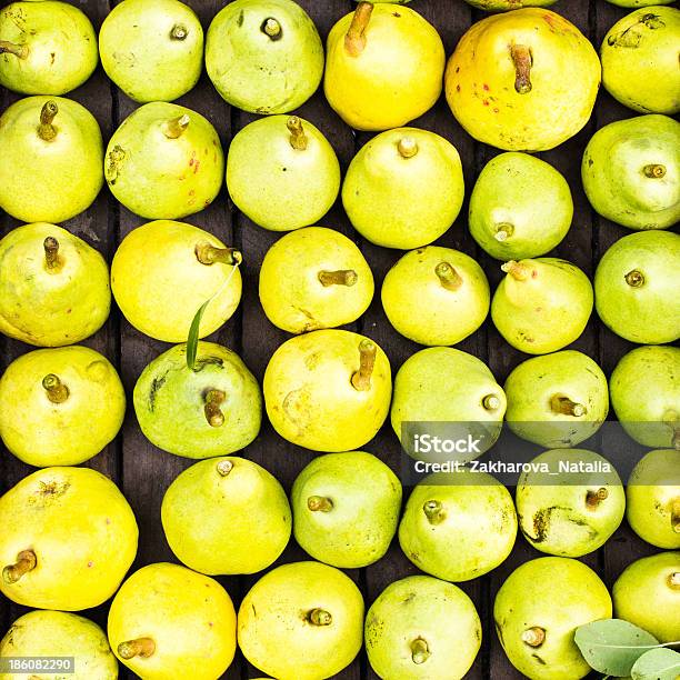 Green And Yellow Pears At A Famers Market As Background Stock Photo - Download Image Now