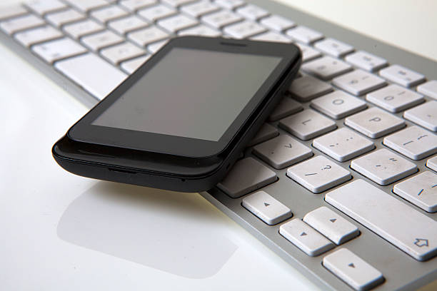 istock Business concept - smartphone and keyboarda 186085167