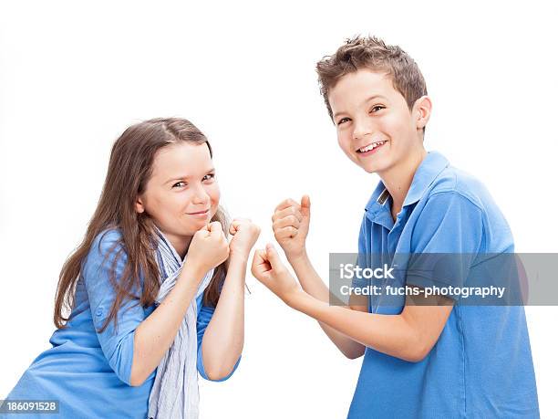 Brother And Sister Fighting Stock Photo - Download Image Now - Beautiful People, Beauty, Blue