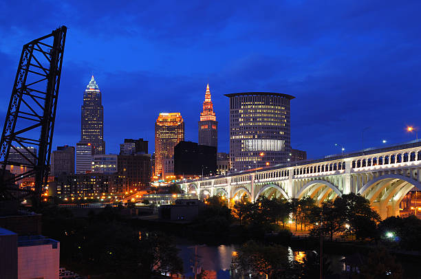 Cleveland skyline at dusk - The BEST view Cleveland skyline at dusk from the overlook. Thunder storm clouds were gathering. terminal tower stock pictures, royalty-free photos & images