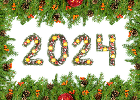Christmas tree framework and 2024 number made by christmas tree branches isolated on white background