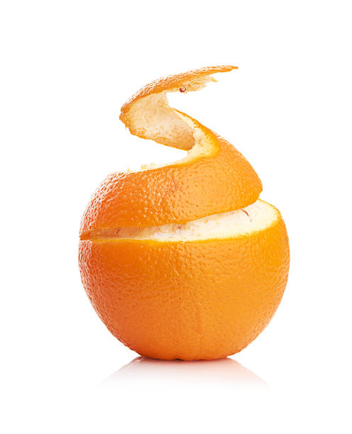 istock orange with peeled spiral skin 186093934