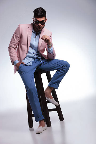 istock seated casual man looking at camera 186094826