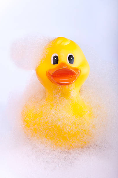 istock Rubber duck in the bath tub 186094939