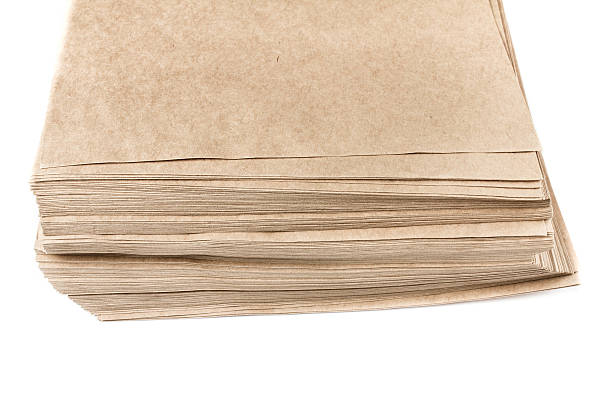 istock Stack Of Recycled Paper envelopes isolated on white background, 186095919