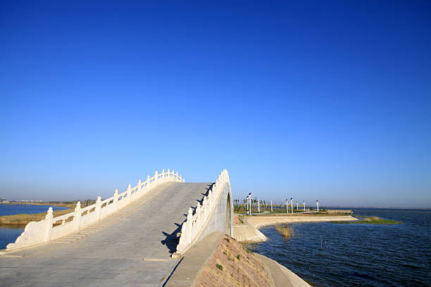 istock bridges in the lake water 186096374