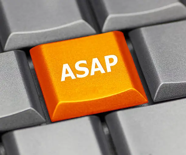 Photo of Computer key orange - ASAP