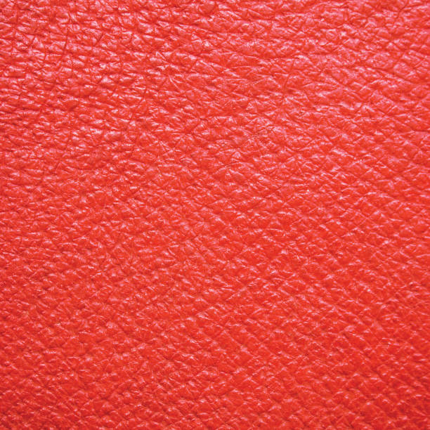 istock Red natural leather texture, detailed textured macro closeup background pattern 186097639