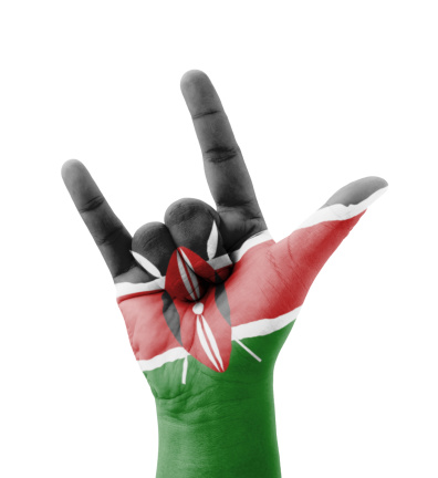Hand making I love you sign, Kenya flag painted, multi purpose concept - isolated on white background
