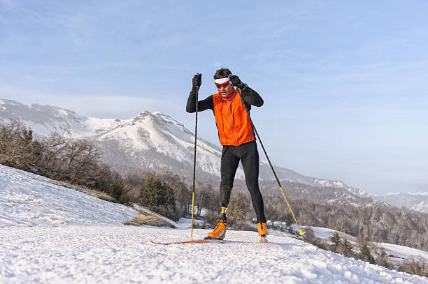ノルディックスキー - mens cross country skiing ストックフォトと画像