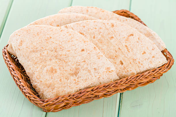 Chapattis Traditional South Asian whole wheat flatbread. shrak stock pictures, royalty-free photos & images