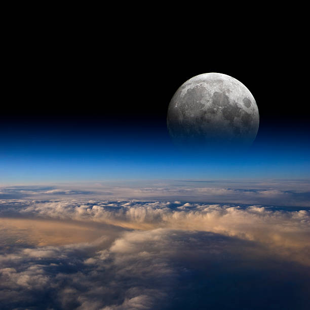 istock The Moon rises over planet Earth 186104118