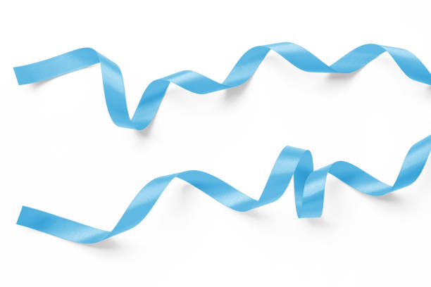 istock Light blue satin ribbon bow color scroll set isolated on white background with clipping path for holiday and wedding card confetti design decoration 1861041929