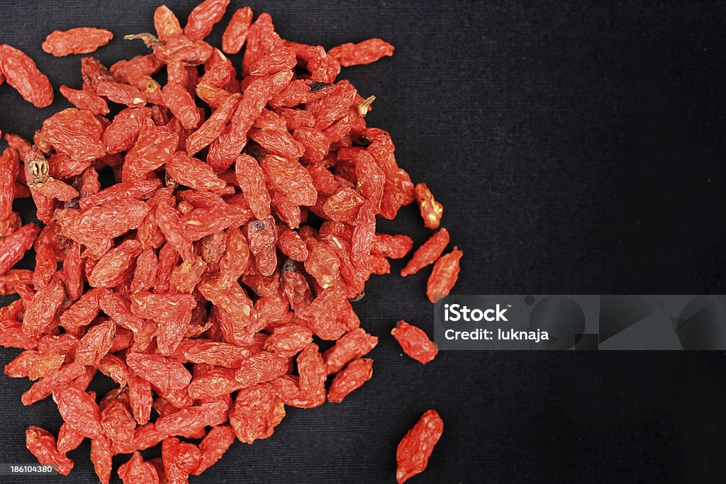 Inclusi frutti di bosco di goji secche rosso - Foto stock royalty-free di Alimentazione sana