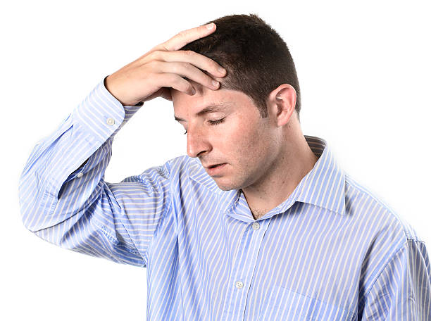 istock businessman over worked headache 186105009