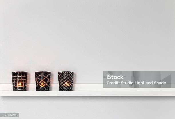 Candle Lights On White Shelf Stock Photo - Download Image Now - Candlestick Holder, Three Objects, Beauty