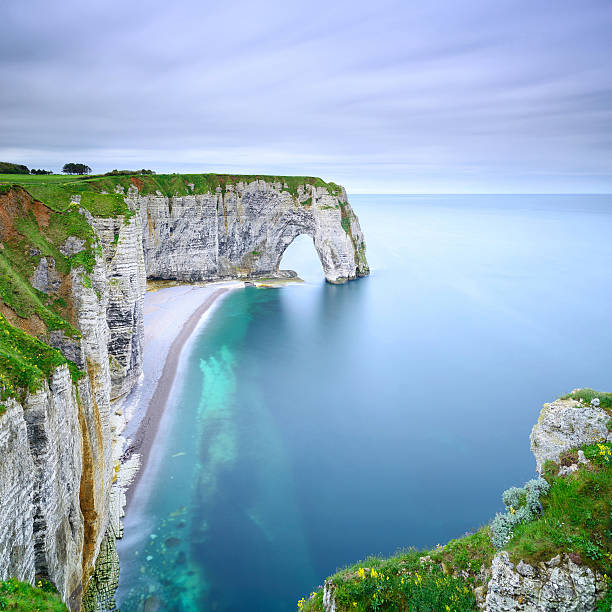 istock Etretat, Manneporte natural rock arch and its beach. Normandy, F 186106061