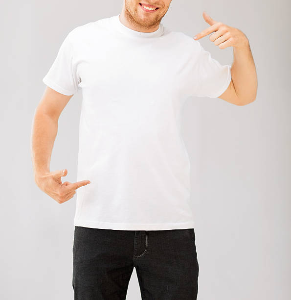 istock man pointing at blank white t-shir 186106599