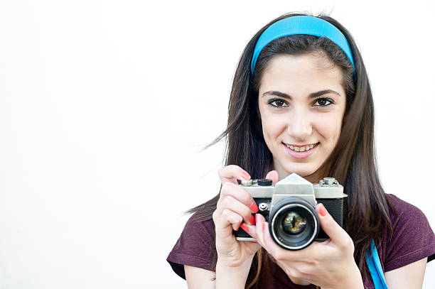 istock Female photographer taking photos 186108250