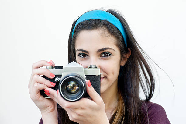 istock Female photographer taking photos 186108253