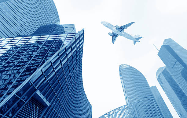 istock airplane with the city 186109528