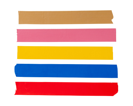 Top view set of multicolor adhesive vinyl or cloth tape in stripes is isolated on white background with clipping path.